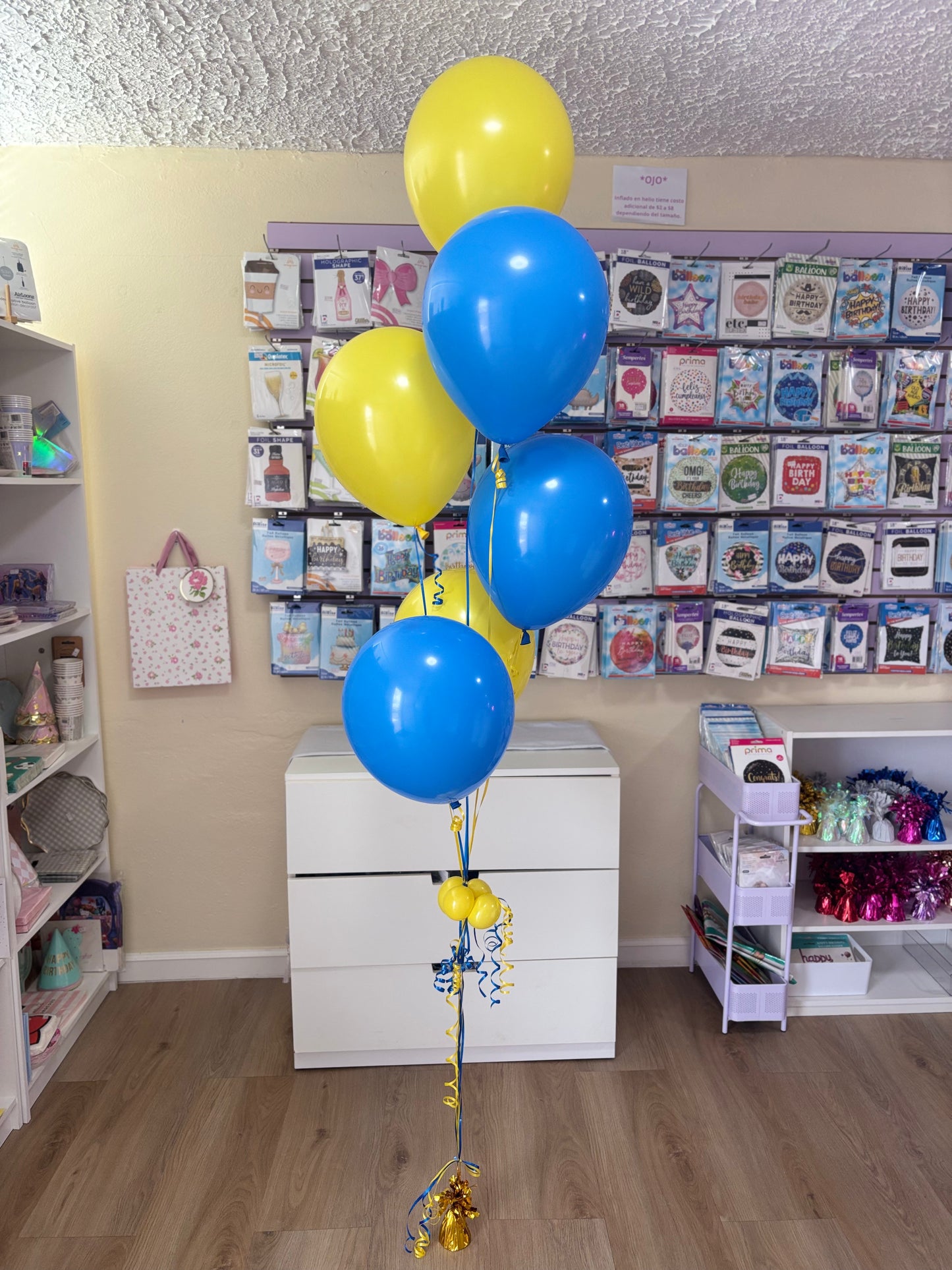 Media docena de globos con helio